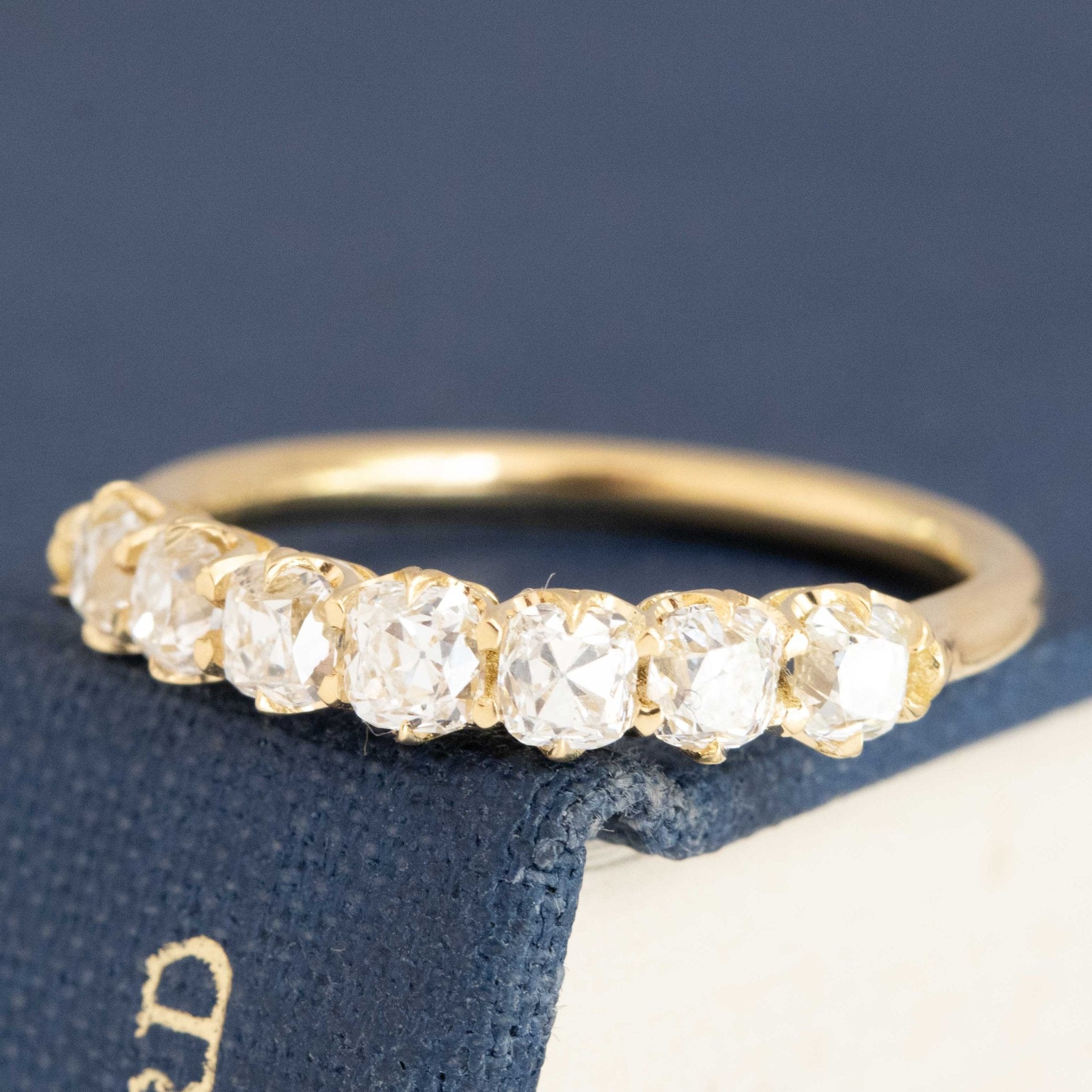 Antique lovers’ 1.00ctw Old Mine Cut Diamond 7-Stone Half-Hoop Band in yellow gold, featuring rare Earth-mined Old Mine Cut Diamonds