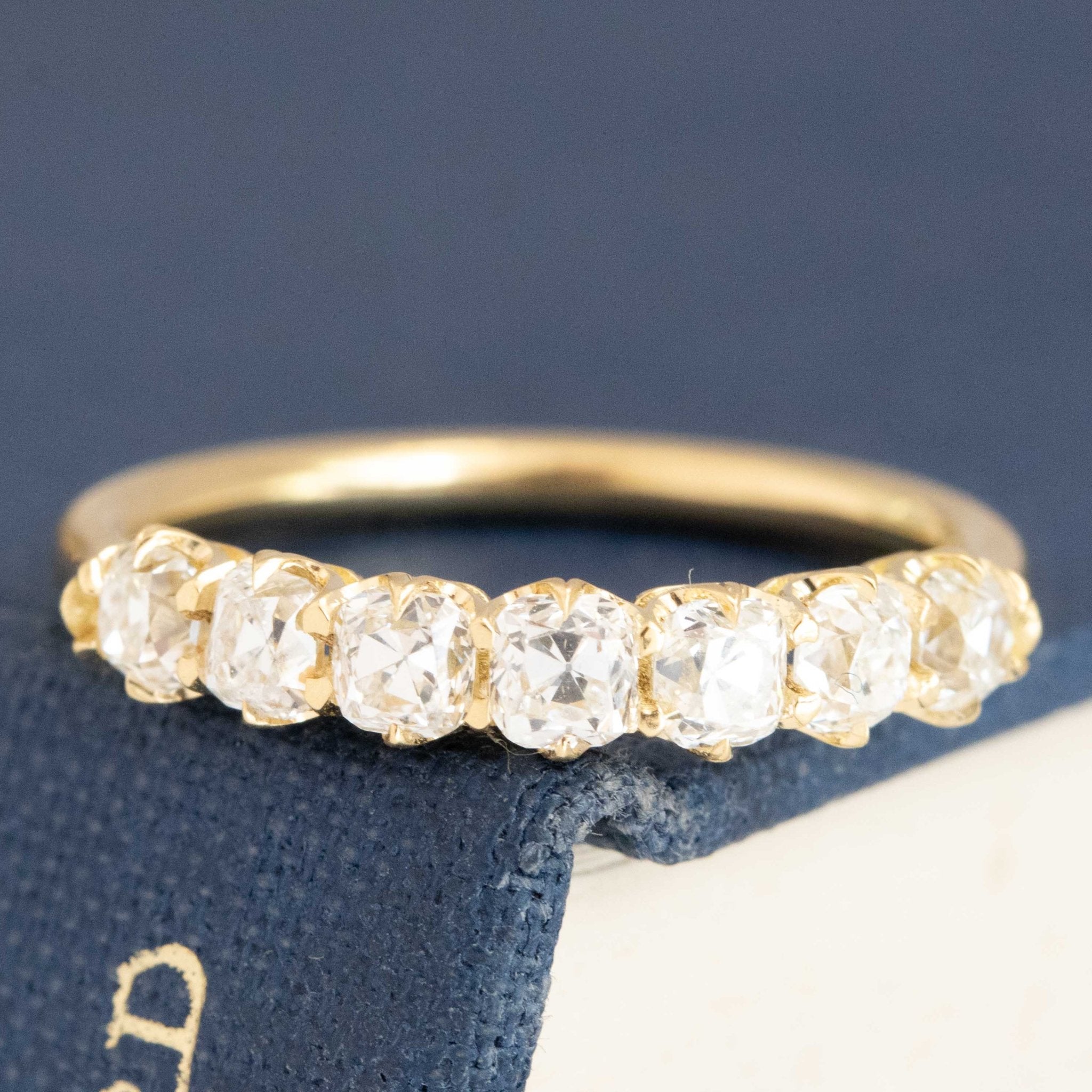 1.00ctw Old Mine Cut Diamond 7-Stone Half-Hoop Band with Old Mine Cut Diamonds in yellow gold, antique-inspired one-of-a-kind wedding band