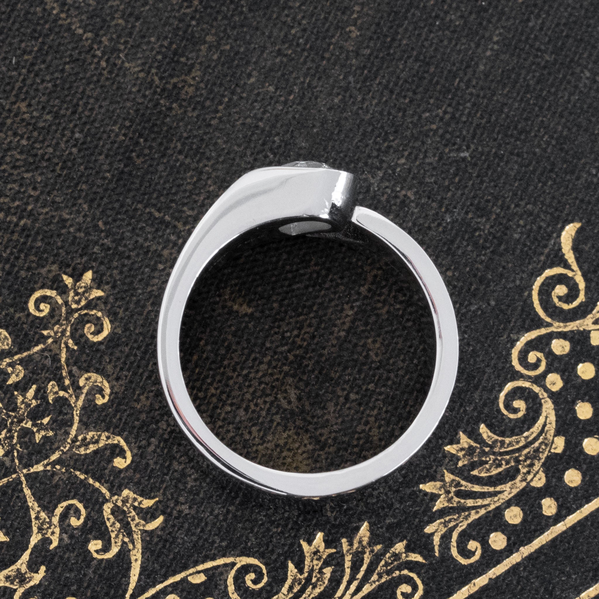 Side view of 1.01ct Pear Cut Diamond Open Cigar Band, GIA E, vintage-inspired band with Antique Diamonds, crafted in platinum