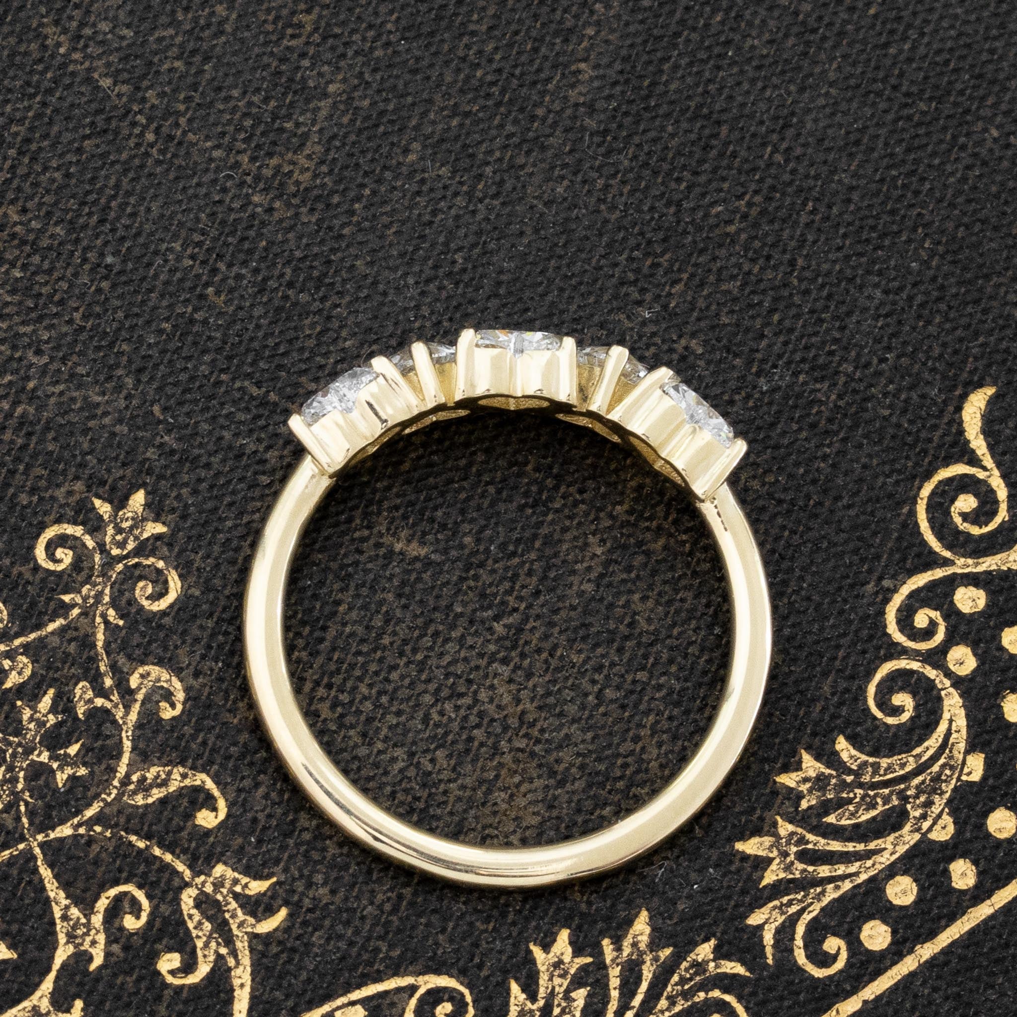 SIde view of 1.01ctw Heart Cut Diamond 5-Stone Band, vintage-inspired band with Antique Diamonds, crafted in yellow gold
