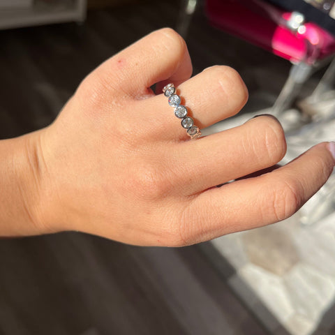Elegant 1.01ctw Old European Cut Diamond Bezel Half-Hoop Band, romantic design with Old European Cut Diamonds, Earth-mined diamonds in platinum shown on ring finger