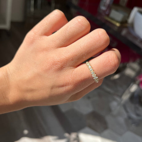 Elegant 1.04ctw Old Mine Cut Diamond Half-Hoop Band, romantic design with Old Mine Cut Diamonds, Earth-mined diamonds in yellow gold shown on ring finger