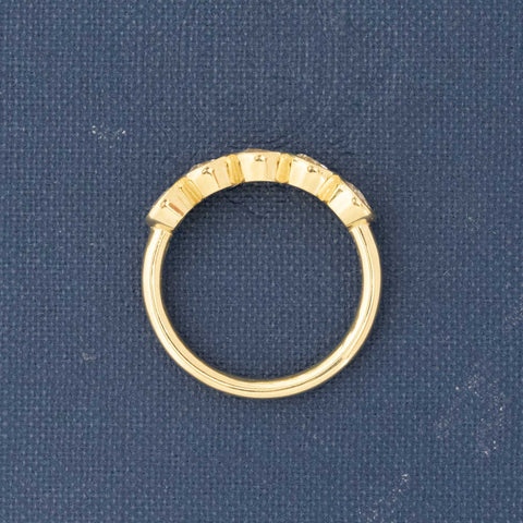 Side view of 1.07ctw Old European Cut Diamond 5-Stone Bezel Band, natural Earth-mined Old European Cut Diamonds in yellow gold