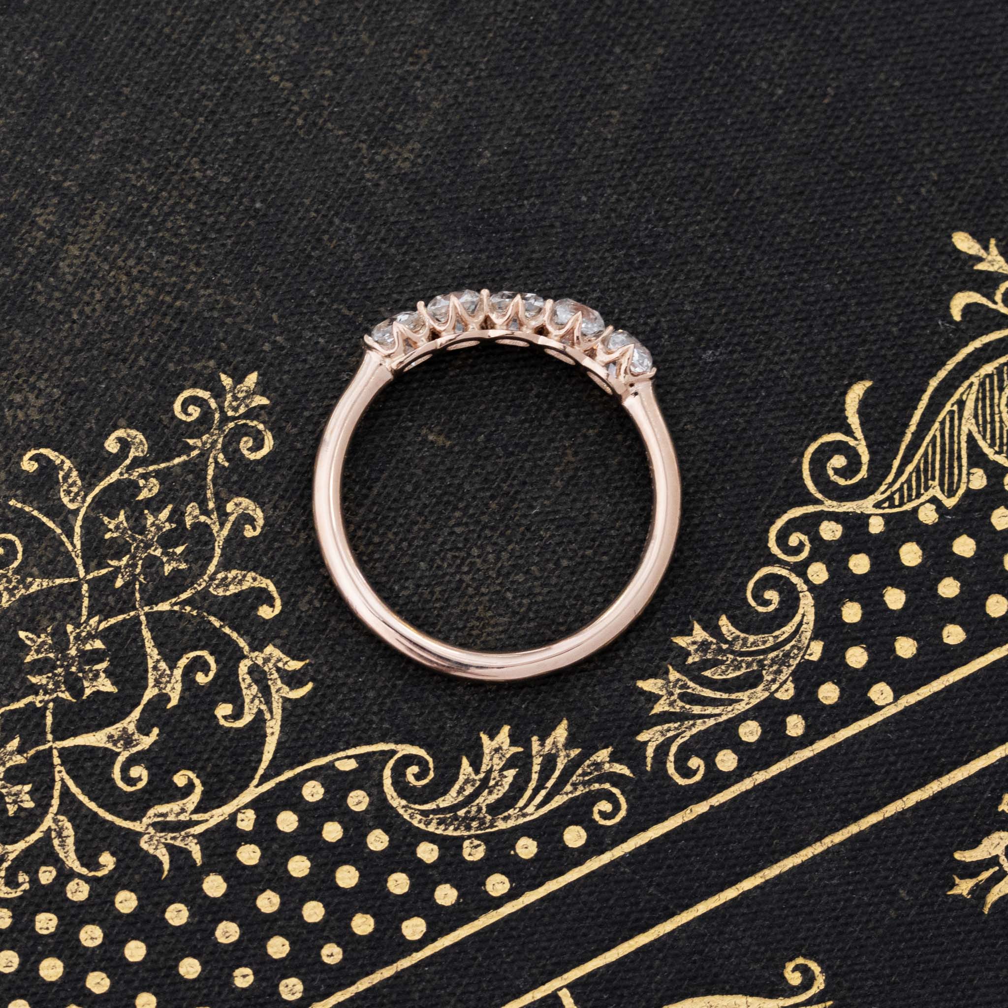 Side view of 1.08ctw Old Mine Cut Diamond 5-Stone Band, vintage-inspired band with Old Mine Cut Diamonds, crafted in rose gold