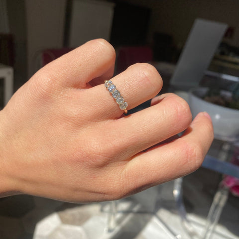 Elegant 1.10ctw Old Mine Cut Diamond 5-Stone Band, romantic design with Old Mine Cut Diamonds, Earth-mined diamonds in yellow gold shown on ring finger