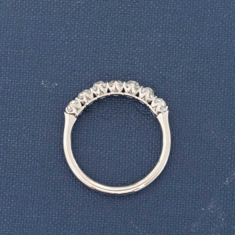Side view of 1.11ctw Old Mine Cut Diamond 7-Stone Band, natural Earth-mined Old Mine Cut Diamonds in platinum