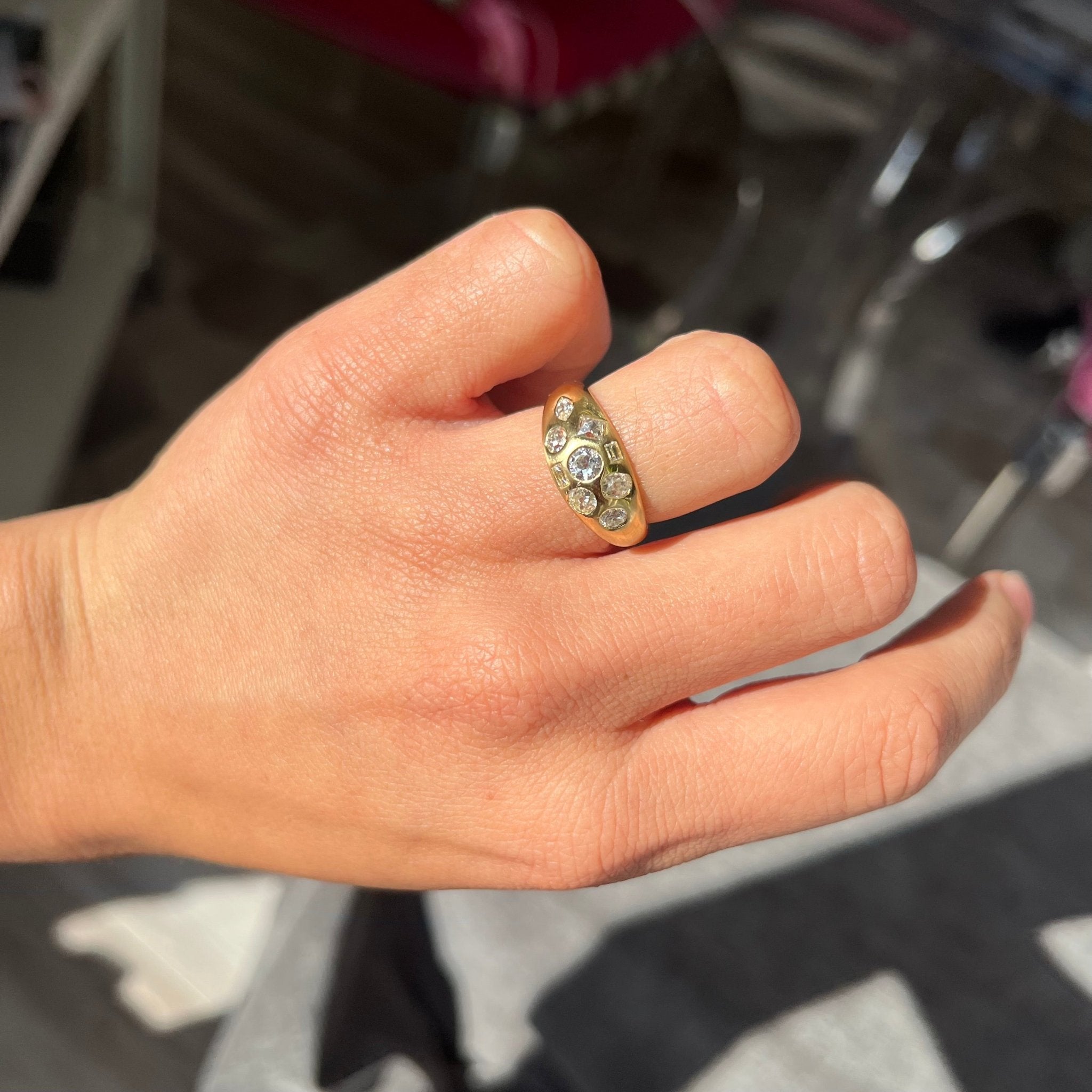 Elegant 1.12ctw Mixed Cut Diamond Bombe Ring, romantic design with Antique Diamonds, Earth-mined diamonds in yellow gold shown on ring finger