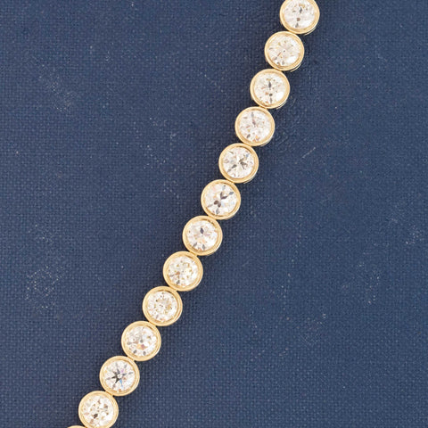 11.44ctw Old European Cut Diamond Bezel Tennis Bracelet in 18kt Yellow Gold, featuring antique-cut diamonds handcrafted in Los Angeles.