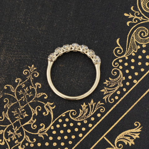 Side view of 1.14ctw Old Mine Cut Diamond 7-Stone Band, vintage-inspired band with Old Mine Cut Diamonds, crafted in yellow gold