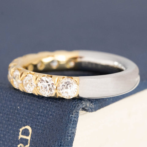 Antique lovers’ 1.17ctw Old European Cut Diamond Half-Eternity Yin-Yang Band in platinum and 18kt yellow gold, featuring rare Earth-mined Old European Cut Diamonds