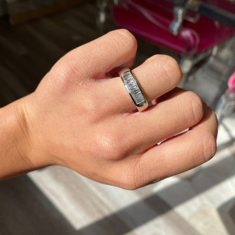 Elegant 1.20ctw French Baguette Cut Diamond 7-Stone Band, romantic design with Baguette Cut Diamonds, Earth-mined diamonds in platinum shown on ring finger