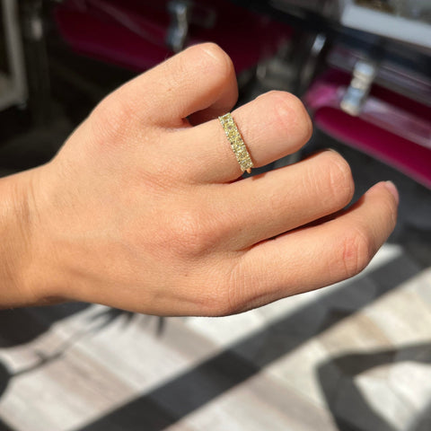 Elegant 1.24ctw Fancy Yellow Asscher Cut Diamond 5-Stone Band, romantic design with Antique Diamonds, Earth-mined diamonds in yellow gold shown on ring finger