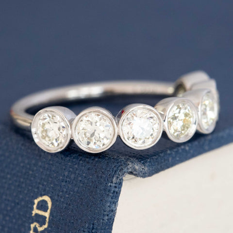 Antique lovers’ 1.27ctw Old European Cut Diamond Bezel Half-Hoop Band in platinum, featuring rare Earth-mined Old European Cut Diamonds