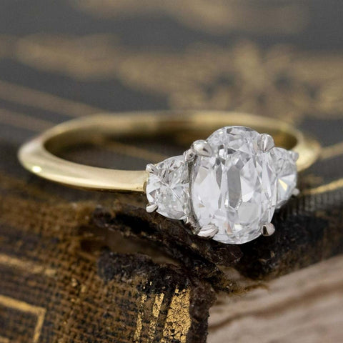 1.27ctw oval cut diamond and half moon trilogy ring, .96ct GIA D VVS1 center, platinum and 18K yellow gold – alternate view 3