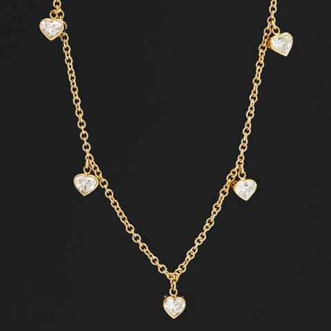 1.30ctw heart shaped diamond bezel station necklace in 18kt yellow gold
