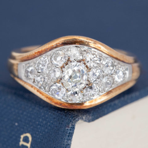 1.50ctw antique old mine cut diamond domed cluster ring, 14K yellow and white gold