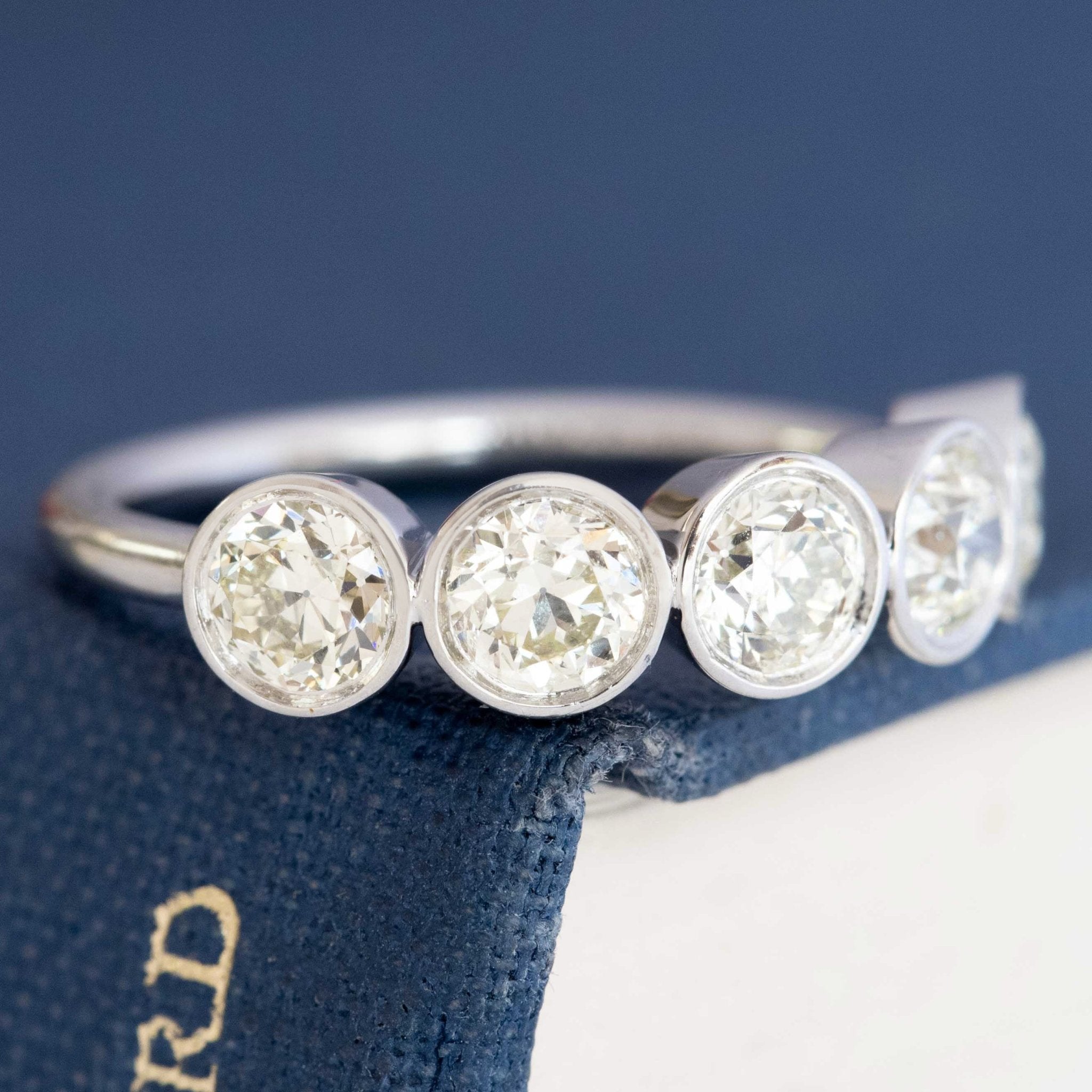 5-stone bezel diamond ring Old European cut