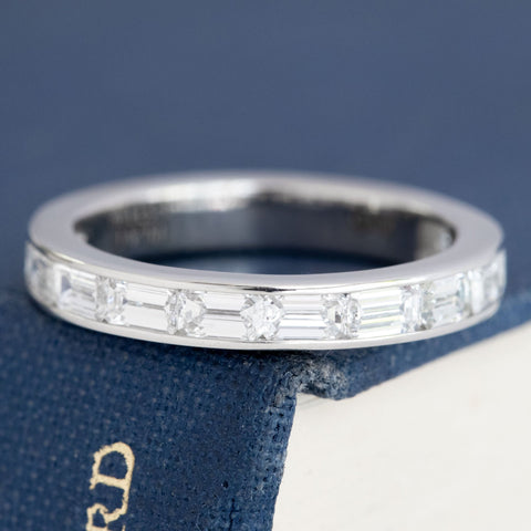 1.53ctw emerald cut diamond half eternity band in platinum