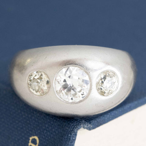 1.72ctw vintage old European cut diamond flush set trilogy ring, platinum