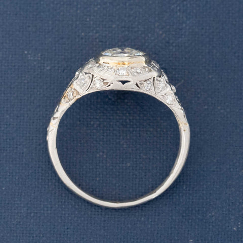 Platinum vintage ring with pear-shaped center diamond