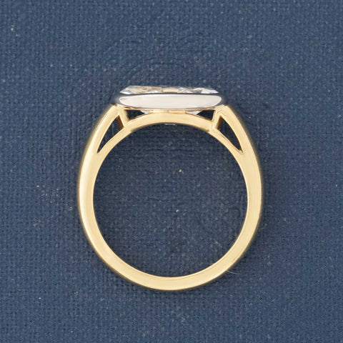 Modern moval cut diamond solitaire bezel ring