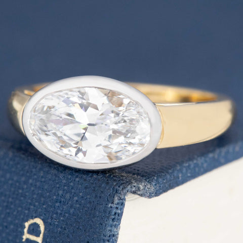 Two tone platinum and 18k gold moval diamond ring