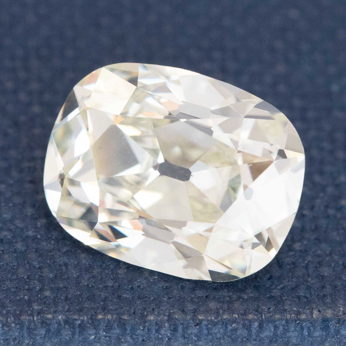 antique natural elongated old mine cut diamond with a GIA certificate