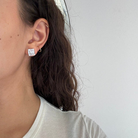 Stud earrings worn on ear showing sparkle and scale, 10.35 × 9.52 mm