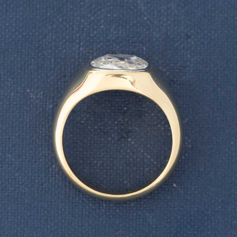 profile of Bezel-set elongated Old Mine Cut diamond solitaire