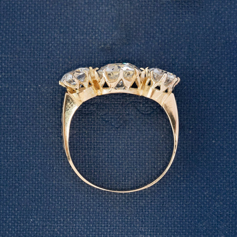 Side profile of Victorian antique diamond ring with engraved gold band