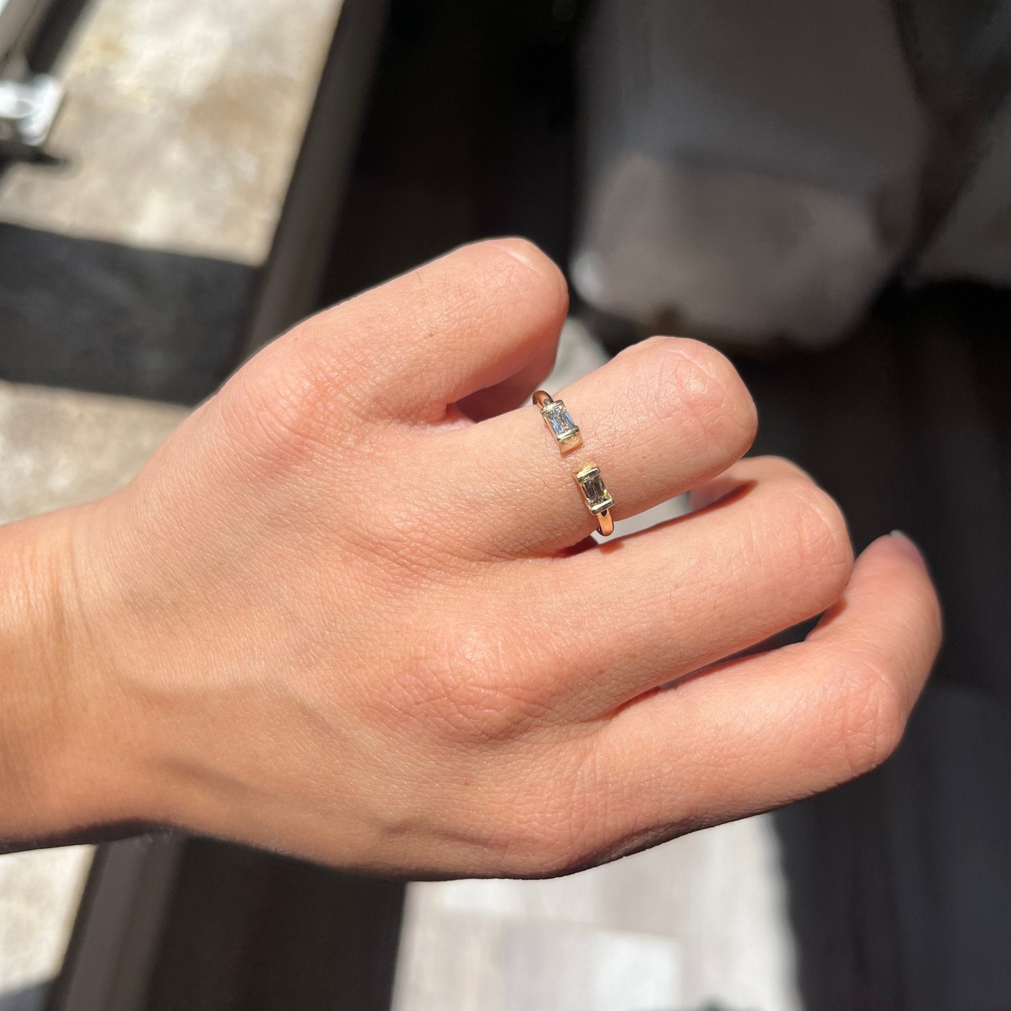 Elegant .33ctw Baguette Cut Diamond Twin Stone Ring, romantic design with Baguette Cut Diamonds, Earth-mined diamonds in yellow gold on ring finger.