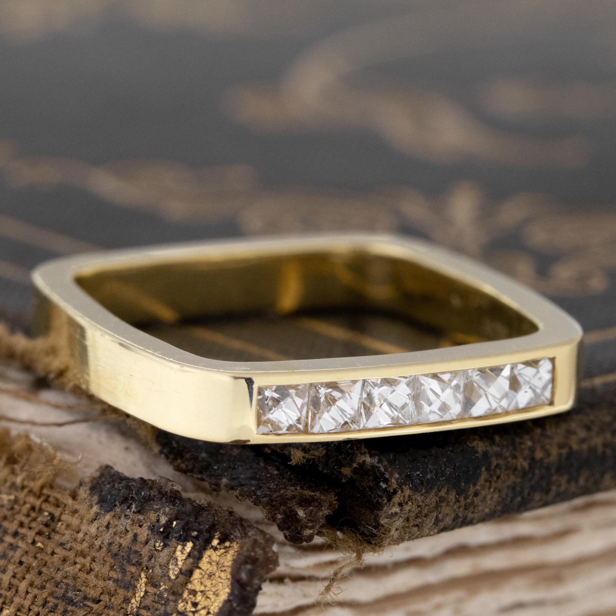 Close-up of .38ctw French Cut Diamond 6-Stone Square Shank Band, vintage-inspired band with French Cut Diamonds, crafted in yellow gold.