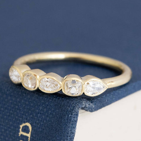 0.44ctw petite pear and old mine cut diamond bezel band in 18kt yellow gold – alternate view 4