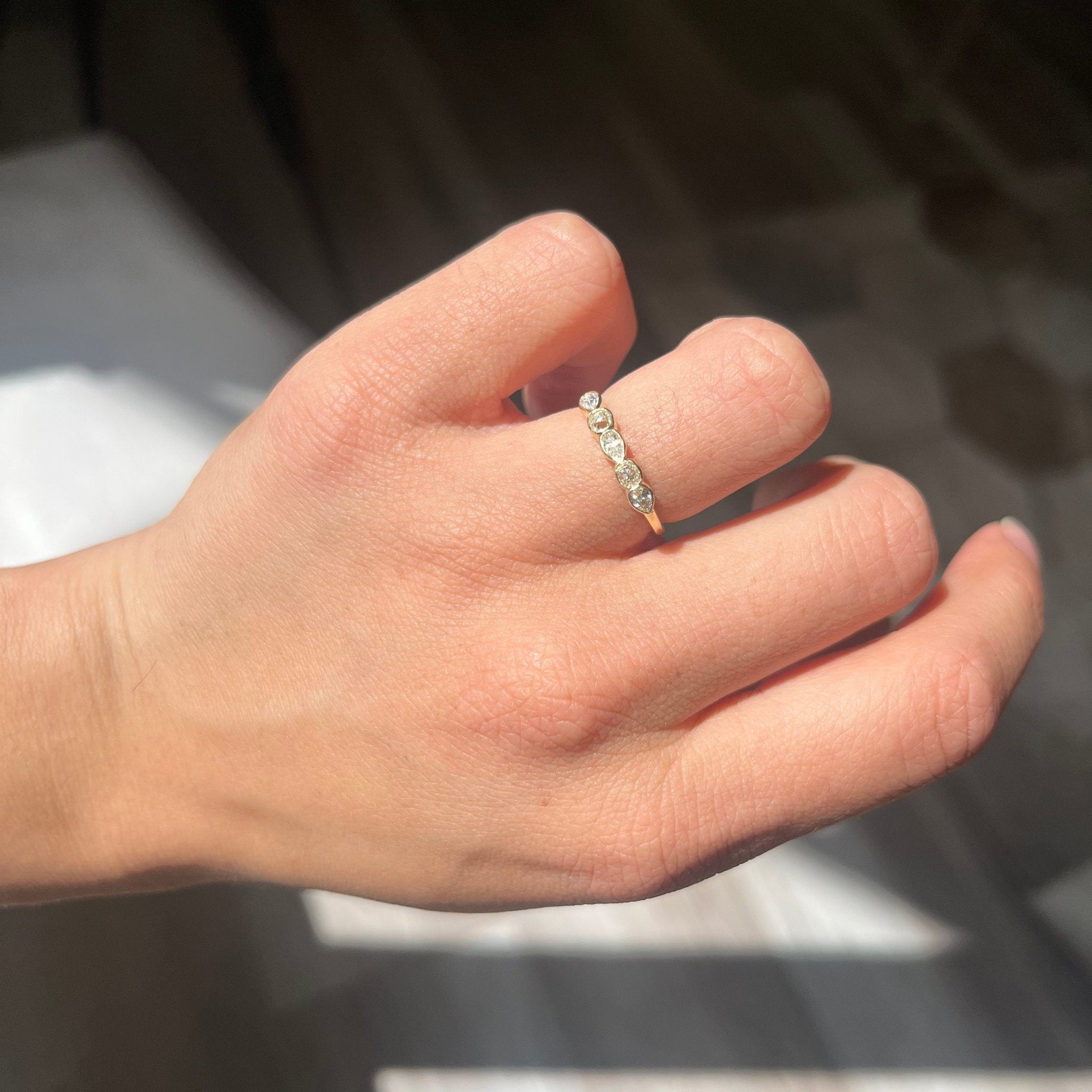 Elegant .44ctw Petite Mixed Cut Diamond Band, romantic design with Old Mine Cut Diamonds, Earth-mined diamonds in yellow gold shown on ring finger.