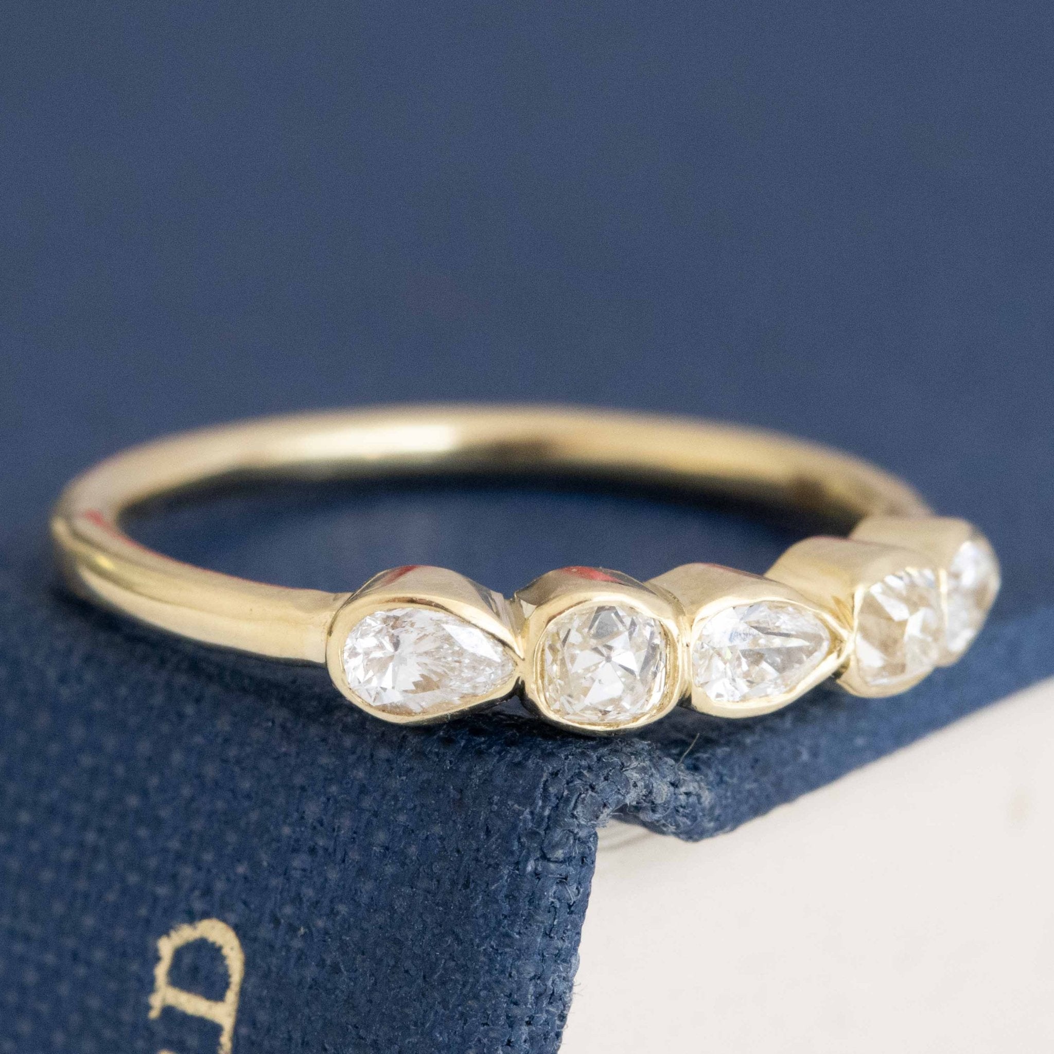 Close-up of .44ctw Petite Mixed Cut Diamond Band, vintage-inspired band with Old Mine Cut Diamonds, crafted in yellow gold.
