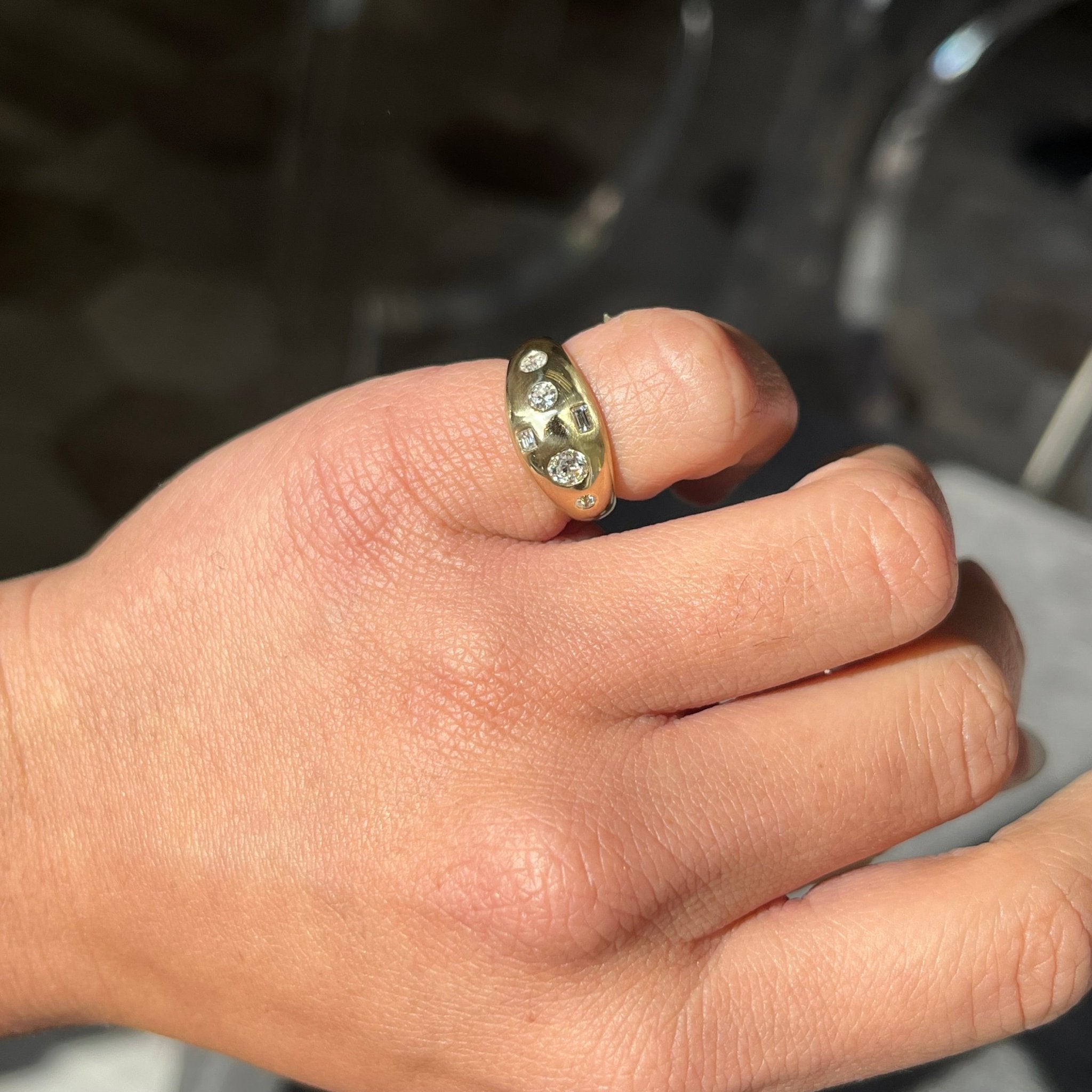 Elegant .45ctw Mixed Cut Diamond Bombe Ring, romantic design with Antique Diamonds, Earth-mined diamonds in yellow gold shown on ring finger.