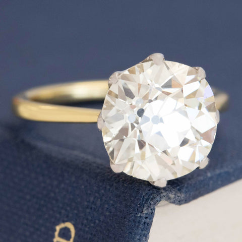 Vintage two-tone diamond ring featuring classic Old Mine Cut faceting.