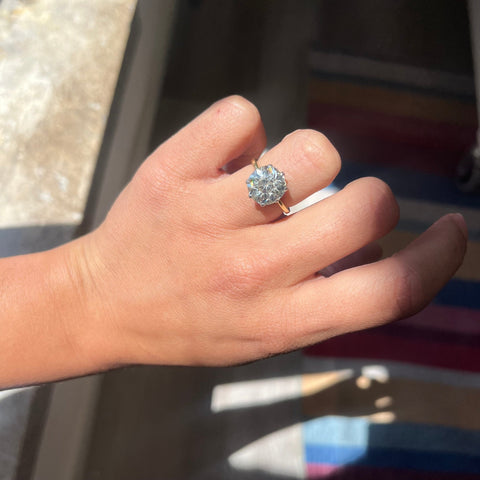 Chunky antique Old Mine Cut diamond with open culet and bright white face-up.
