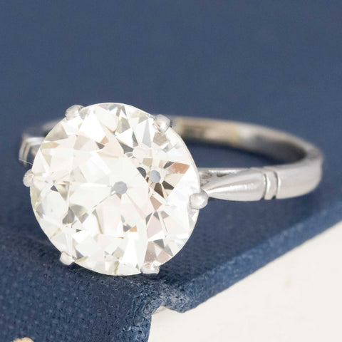Warm ivory Old European Cut diamond engagement ring, antique solitaire.