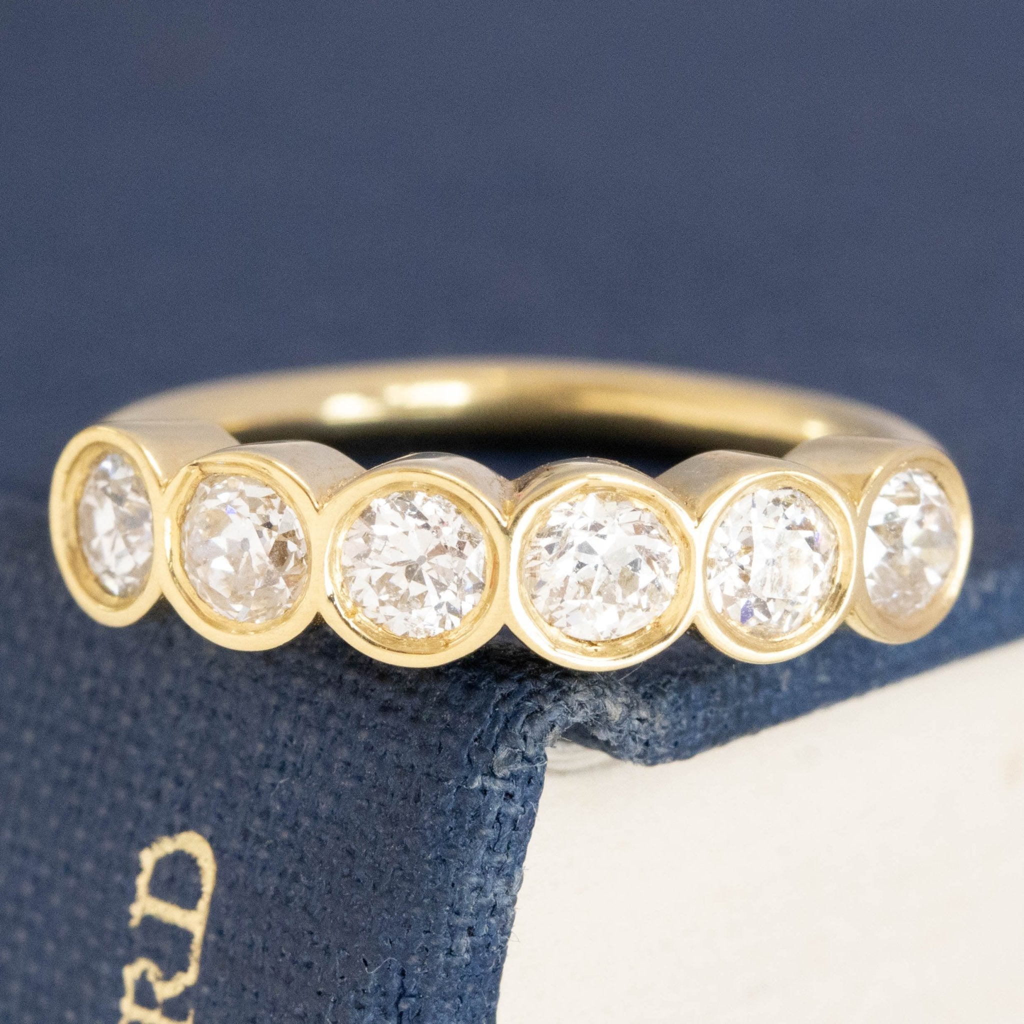 .52ctw Old European Cut Diamond 6-Stone Bezel Band with Old European Cut Diamonds in yellow gold, antique-inspired one-of-a-kind wedding band.