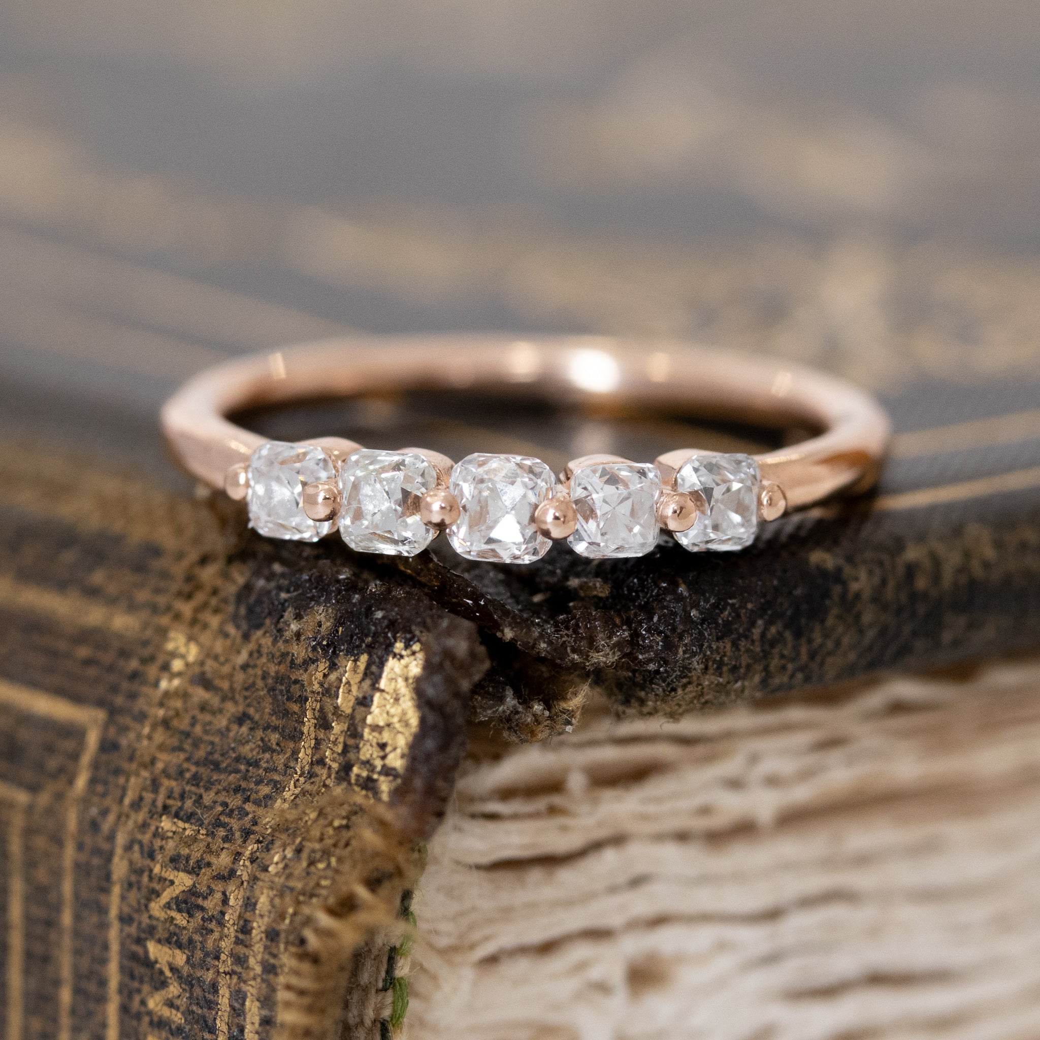 .53ctw Old Mine Cut Diamond Shared Prong Band with Old Mine Cut Diamonds in rose gold, antique-inspired one-of-a-kind wedding band.