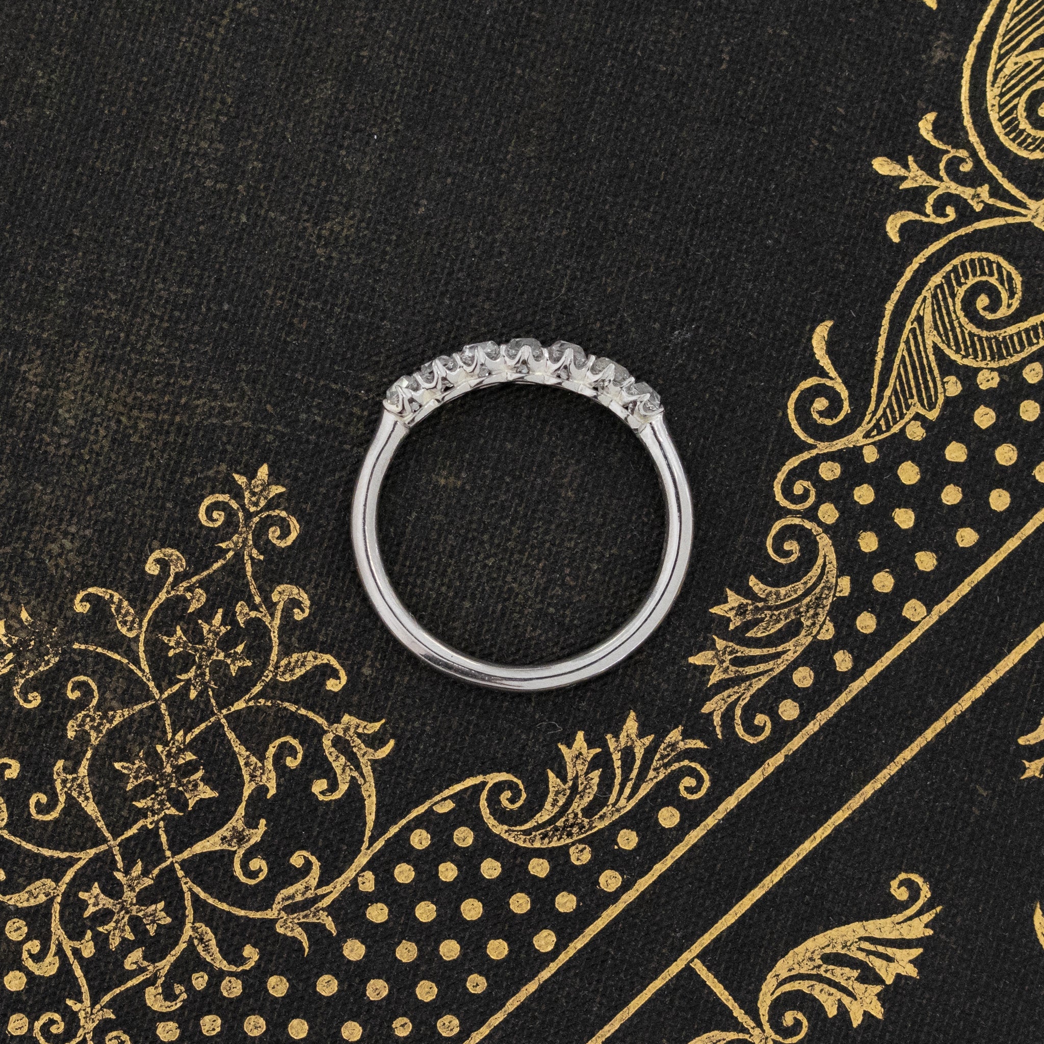 Side view of .53ctw Petite Old Mine Cut Diamond Band, natural Earth-mined Old Mine Cut Diamonds in platinum.
