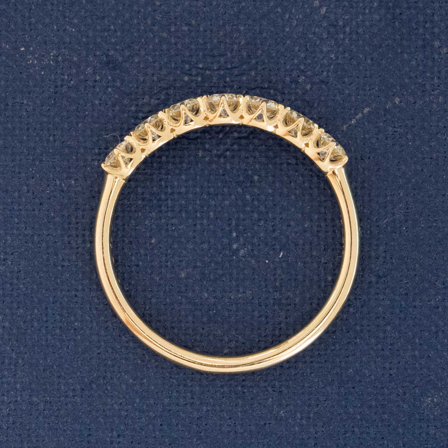Side view of .54ctw Old European Cut Diamond 7-Stone Band, natural Earth-mined Old European Cut Diamonds in yellow gold.