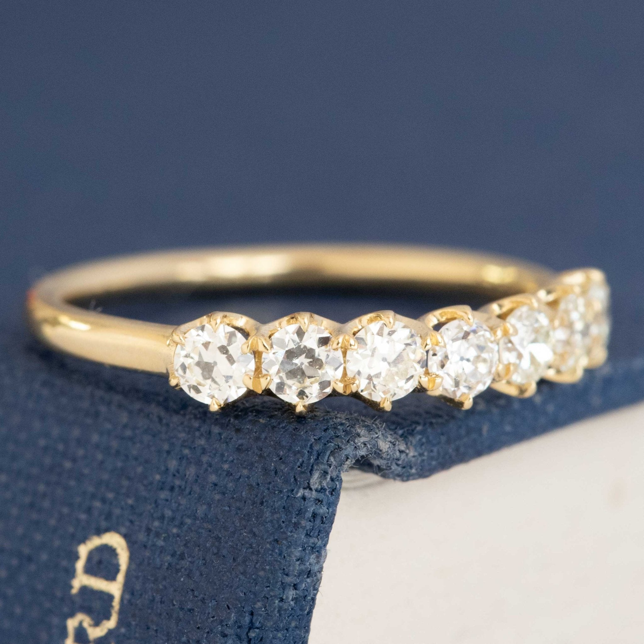 Historic style .54ctw Old European Cut Diamond 7-Stone Band wedding band with Old European Cut Diamonds, unique heirloom in yellow gold.