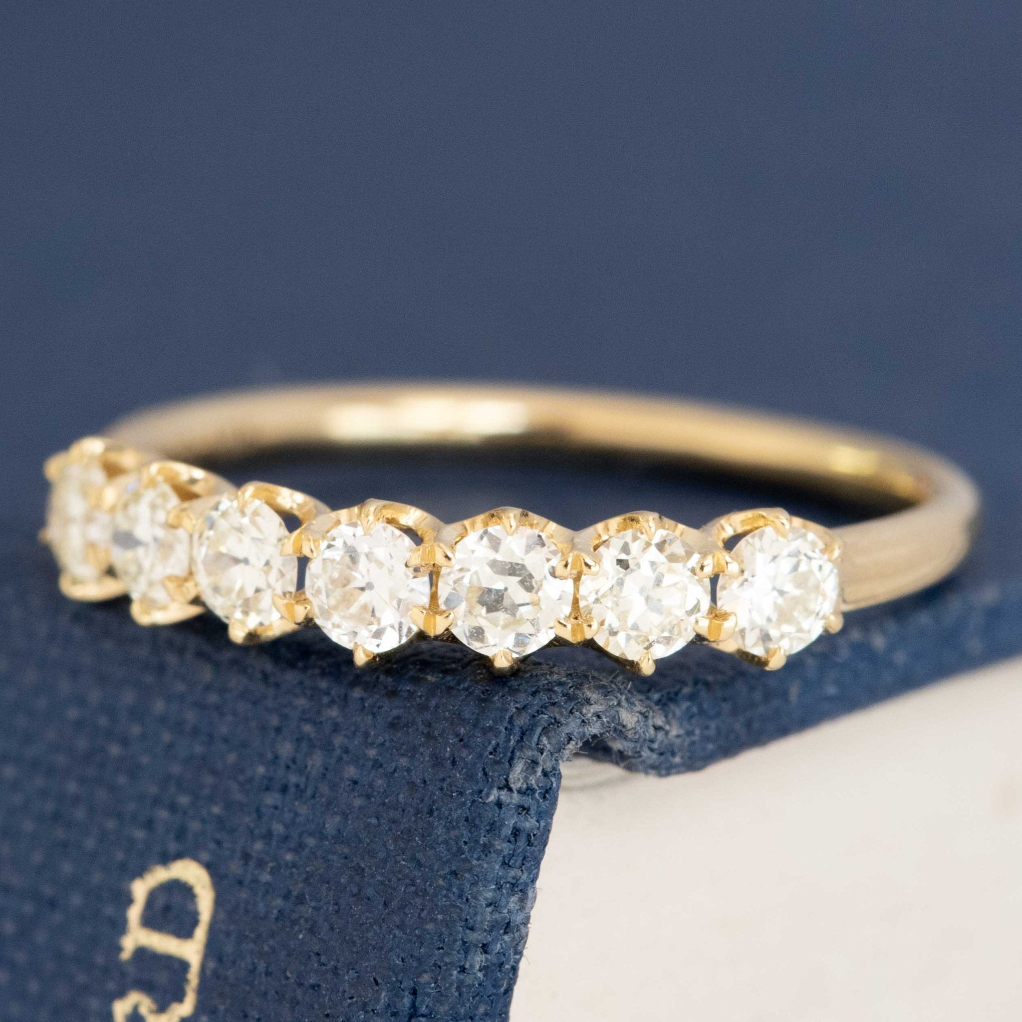 Antique lovers’ .54ctw Old European Cut Diamond 7-Stone Band in yellow gold, featuring rare Earth-mined Old European Cut Diamonds.