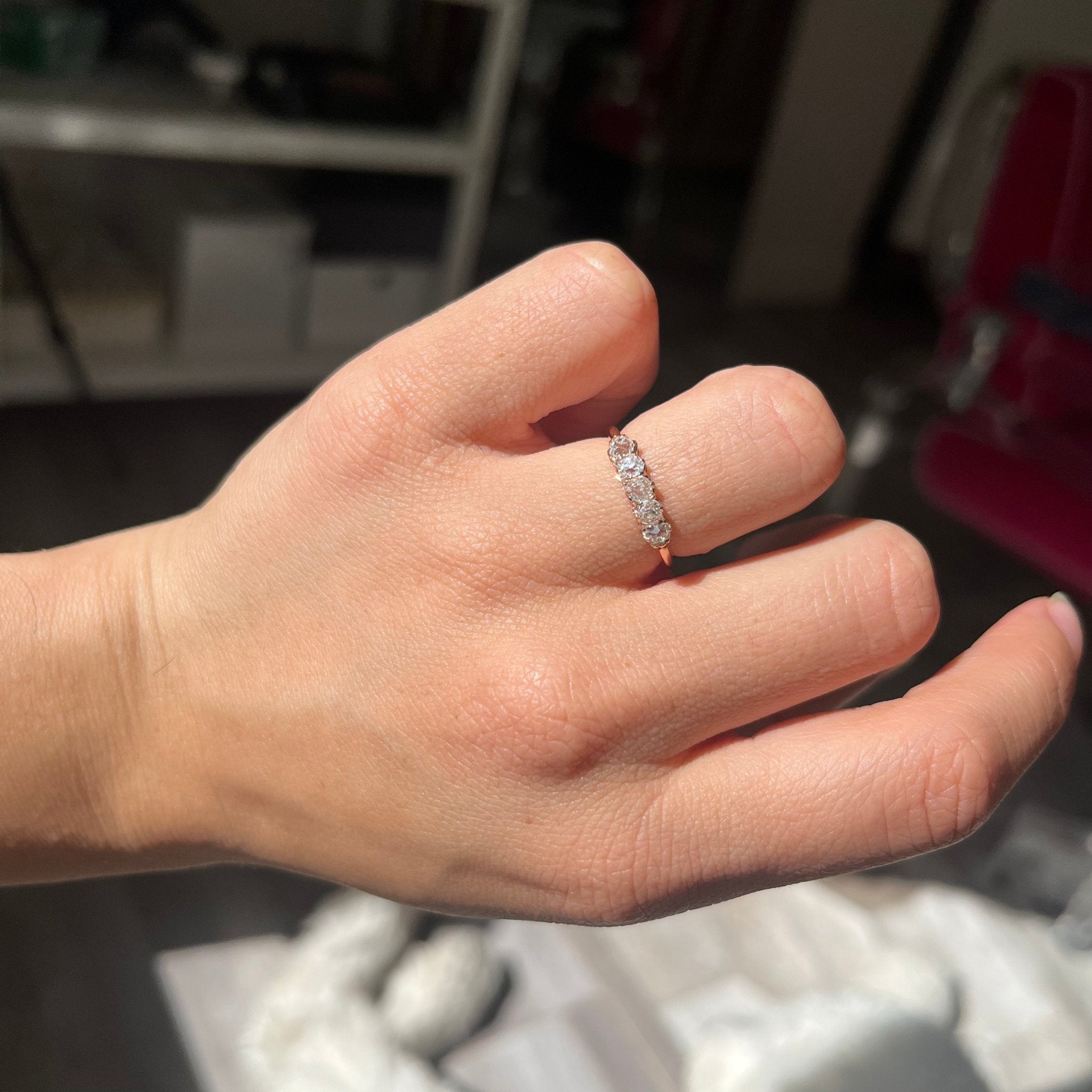 Elegant .56ctw Petite Old Mine Cut Diamond 5-Stone Band, romantic design with Old Mine Cut Diamonds, Earth-mined diamonds in rose gold shown on ring finger.