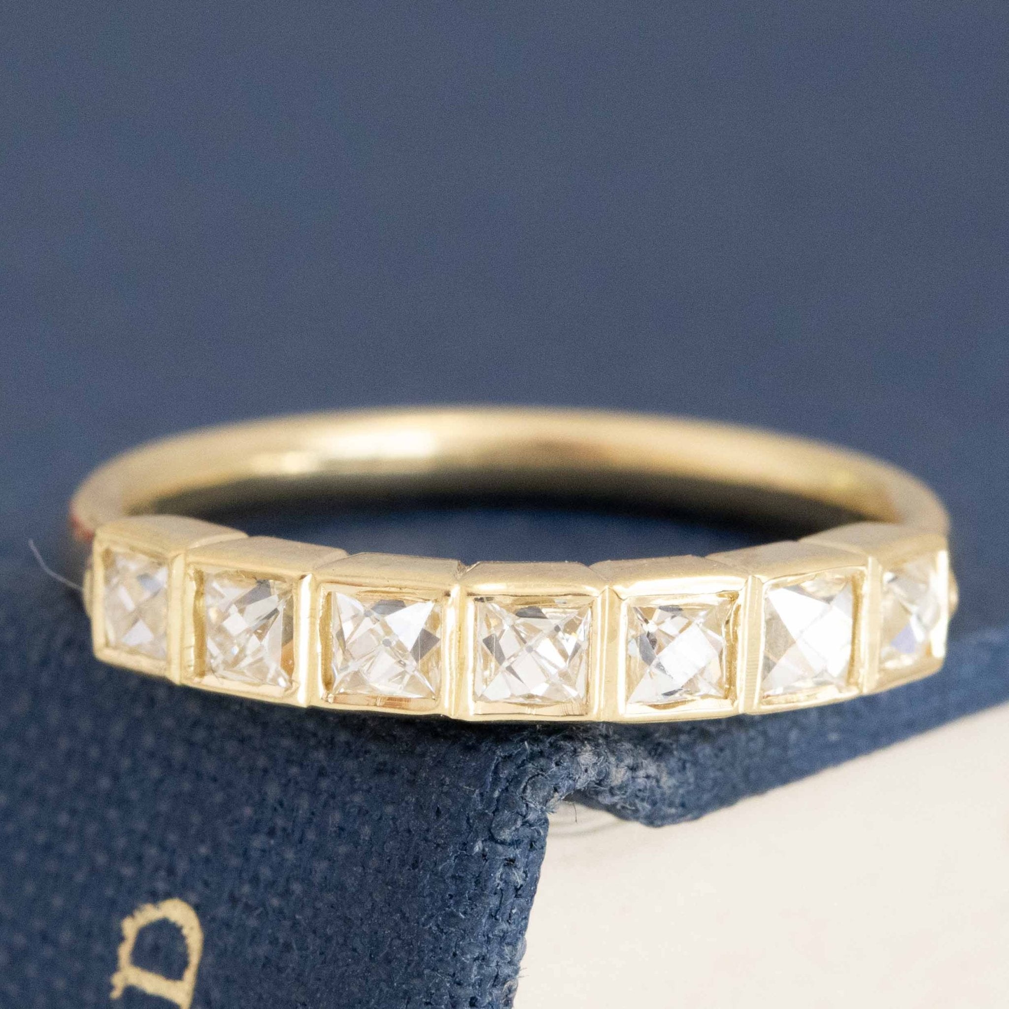 Antique lovers’ .57ctw French Cut Diamond Bezel Band in yellow gold, featuring rare Earth-mined French Cut Diamonds.