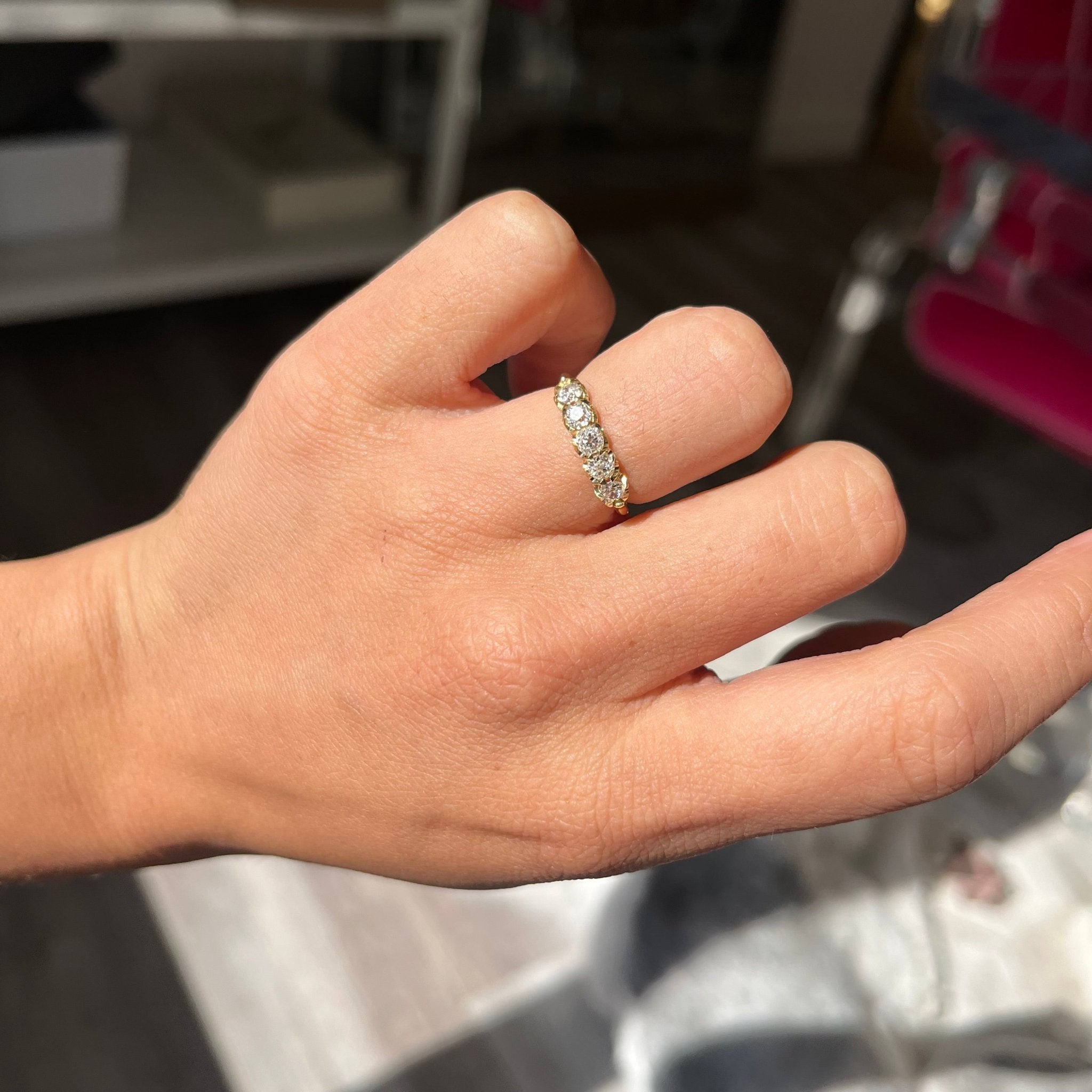 Elegant .58ctw Petite Old European Cut Diamond 5-Stone Band, romantic design with Old European Cut Diamonds, Earth-mined diamonds in yellow gold shown on ring finger.