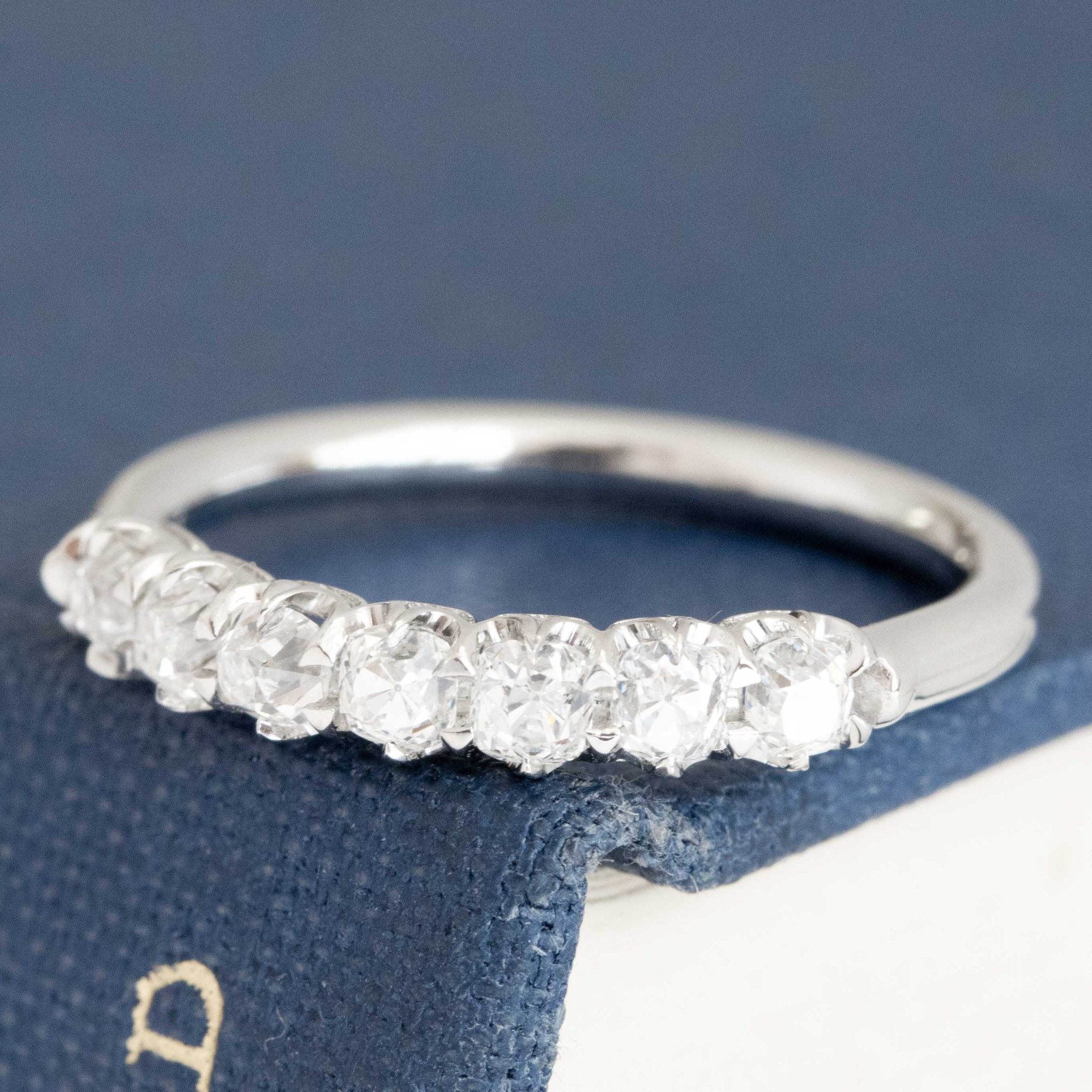 Antique lovers’ .58ctw Petite Old Mine Cut Diamond Half-Hoop Band in platinum, featuring rare Earth-mined Old Mine Cut Diamonds.