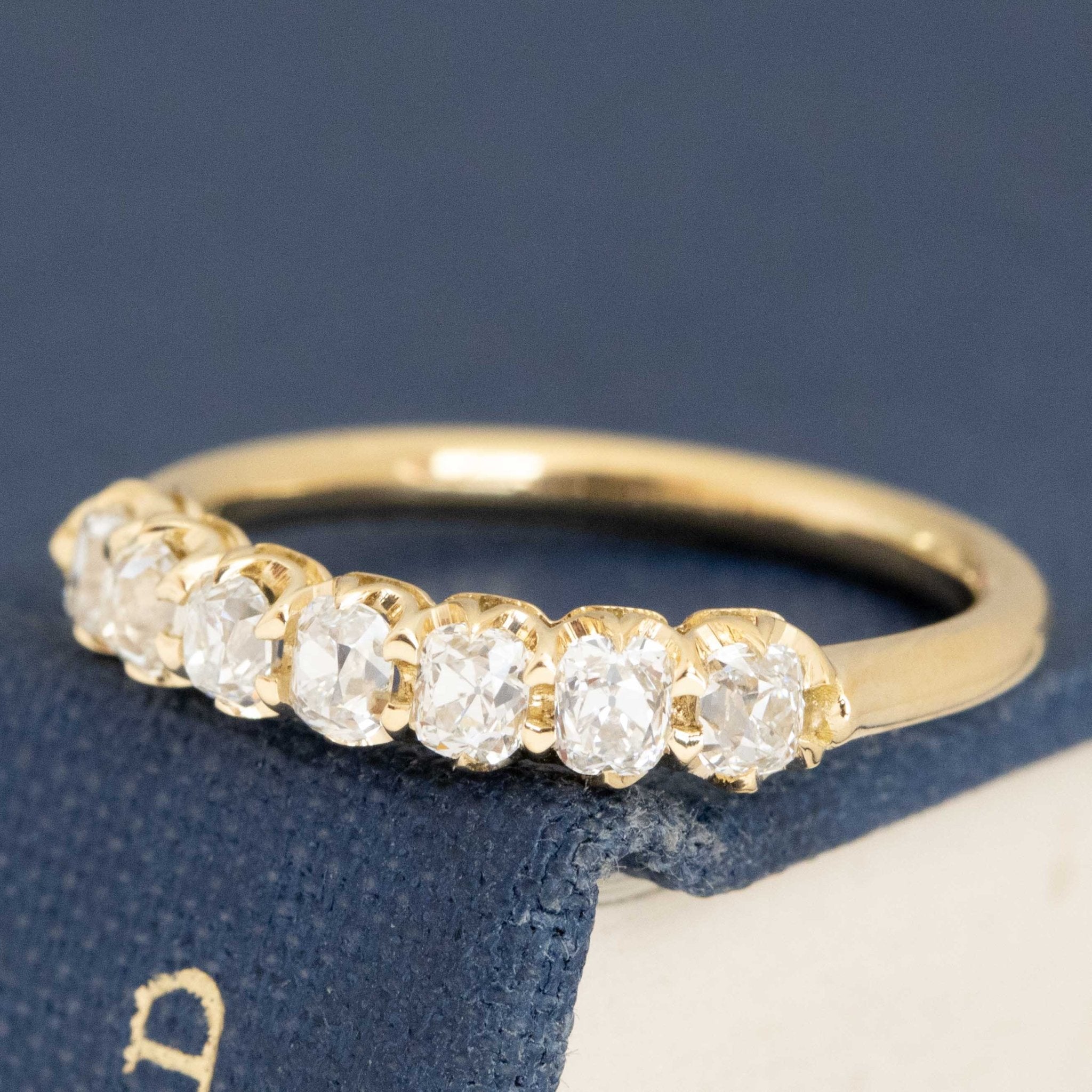 Antique lovers’ .58ctw Petite Old Mine Cut Diamond Half-Hoop Band in yellow gold, featuring rare Earth-mined Old Mine Cut Diamonds.
